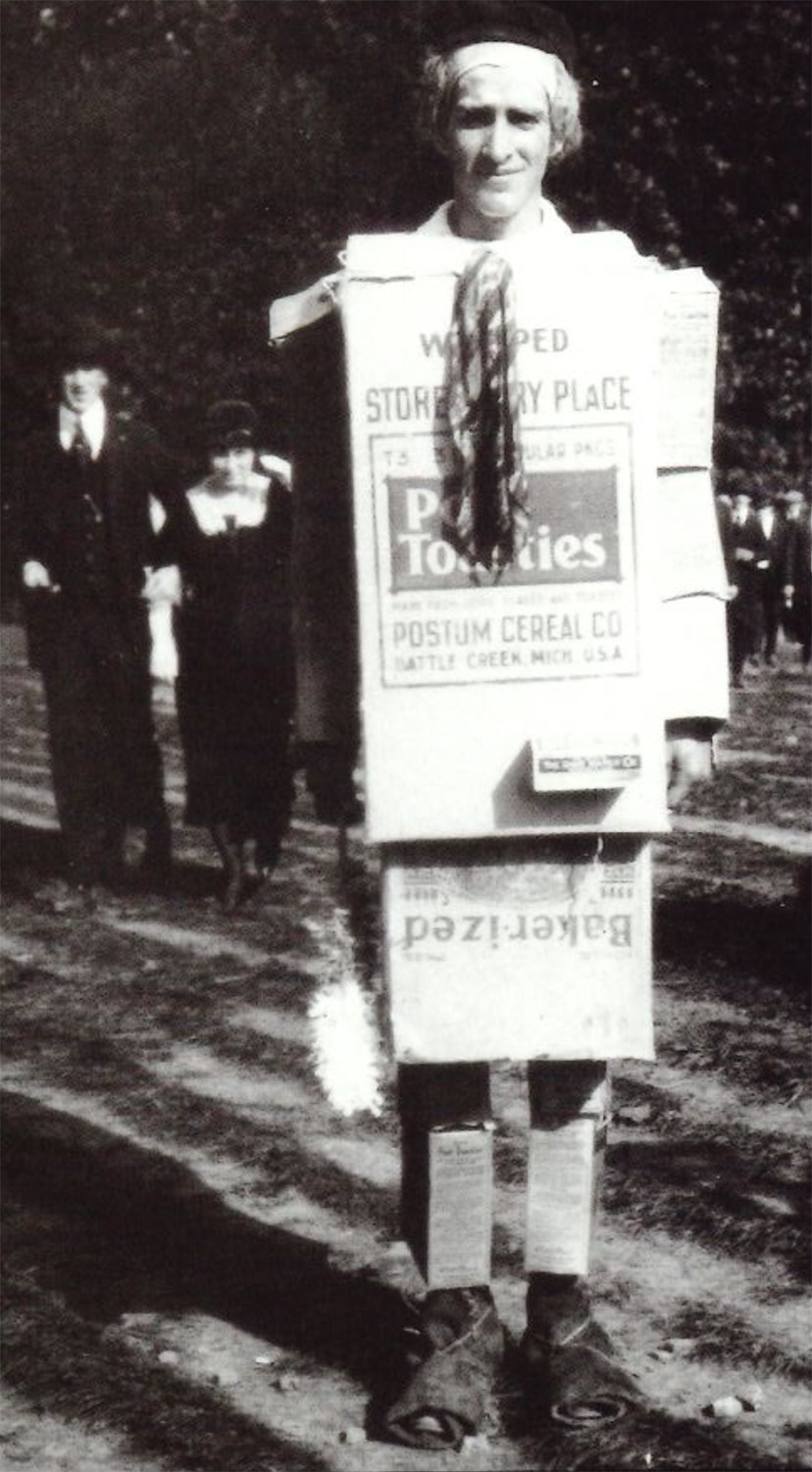 photo of a man dressed up in cardboard for Poverty Day by Penn State Archives